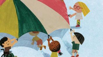 Diverse group of kids holding a colorful parachute