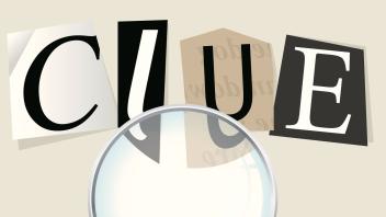 magnifying glass over the ransome-style letters for the word "clue"