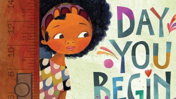 Young multiracial girl walking through the classroom door