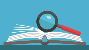 Illustration of magnifying glass on open book