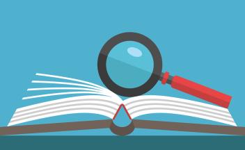 Illustration of magnifying glass on open book